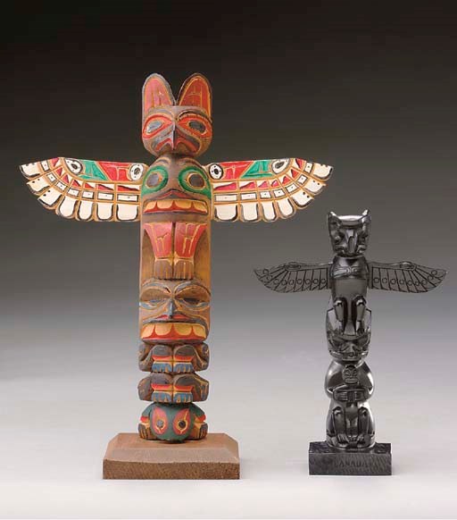 TWO NORTHWEST COAST MODEL TOTEM POLES