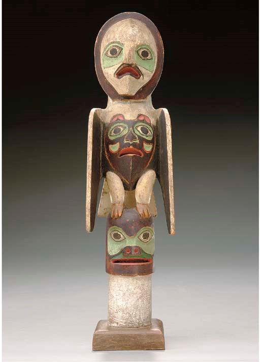 A NORTHWEST COAST WOOD MODEL TOTEM POLE