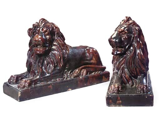 A PAIR OF SCOTTISH 'SALT-GLAZED' EARTHENWARE LIONS