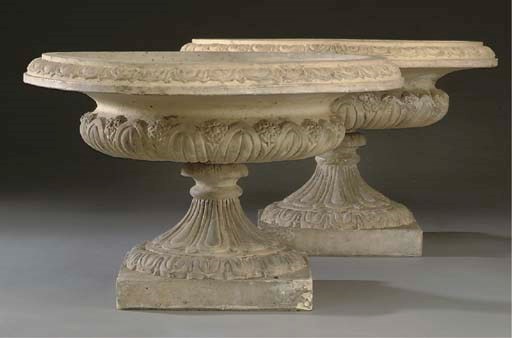 A PAIR OF VICTORIAN TERRACOTTA URNS