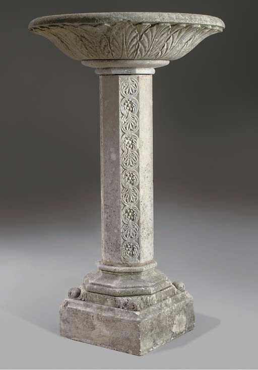 A PORTLAND STONE BIRD BATH