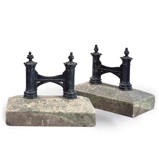 A PAIR OF EARLY VICTORIAN CAST IRON BOOTSCRAPPERS
