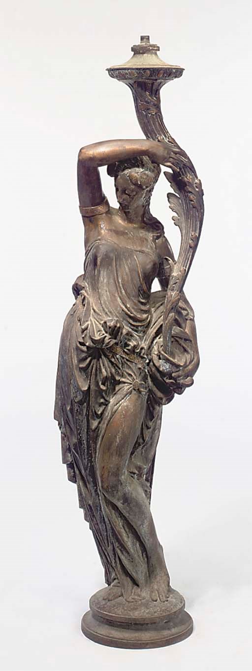 A FRENCH CAST IRON FIGURAL TORCHERE