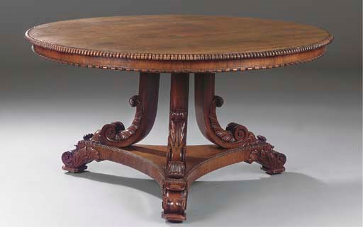 A REGENCY ROSEWOOD CIRCULAR BREAKFAST-TABLE