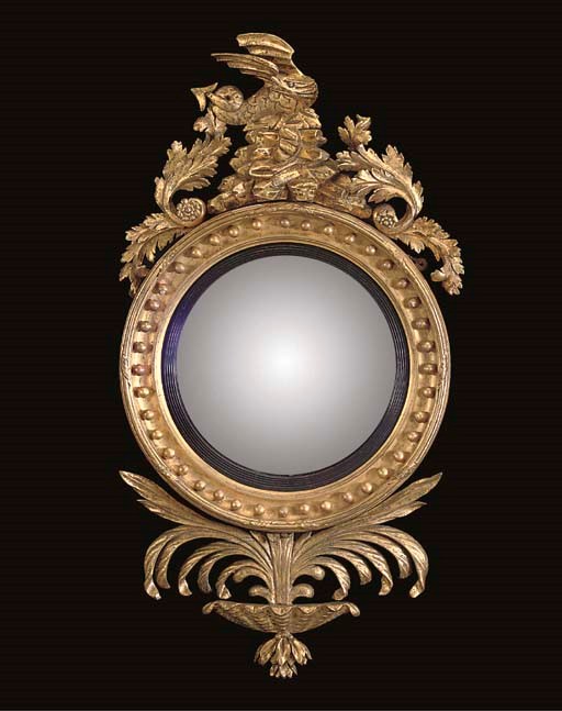 A WILLIAM IV GILTWOOD CONVEX MIRROR