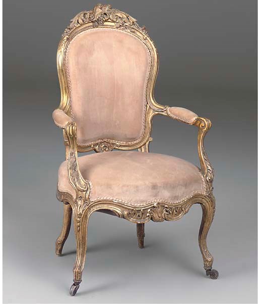 A VICTORIAN GILTWOOD ARMCHAIR