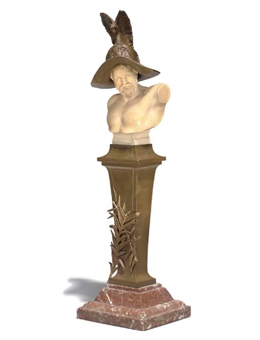 AN IVORY AND BRONZE BUST ON PEDESTAL