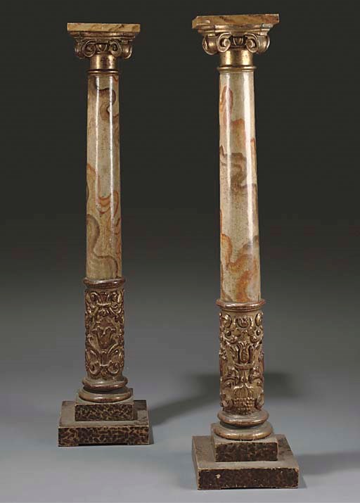 A PAIR OF ITALIAN GILTWOOD AND GESSO COLUMN PEDESTALS