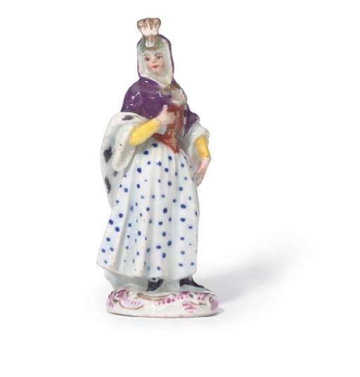 A GERMAN MEISSEN PORCELAIN FIGURE OF THE QUEEN