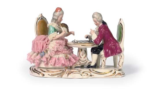 A VOLKSTEDT PORCELAIN FIGURE GROUP OF TWO CHESS PLAYERS
