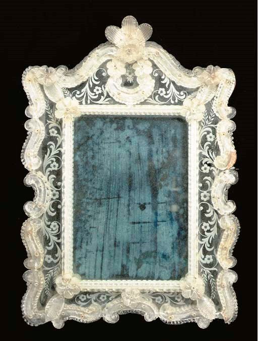 A VENETIAN ETCHED GLASS MIRROR,