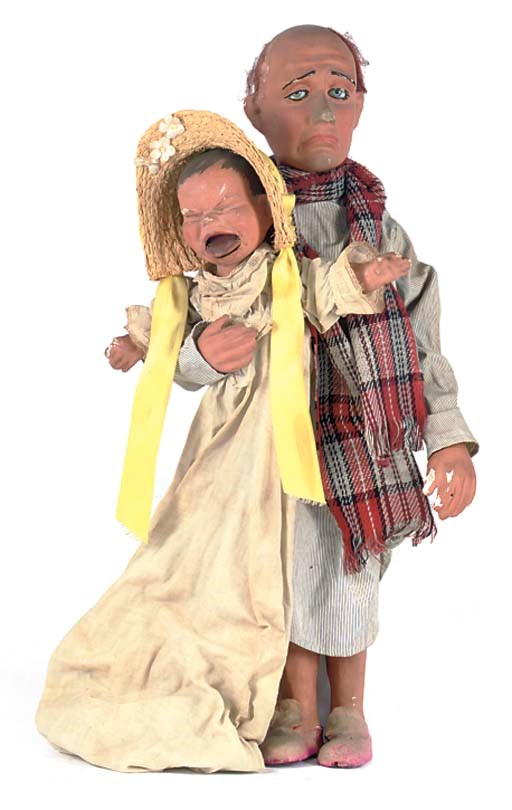 A Father and Baby figure from 'The Cry Baby' working model by Modern Enterprises, London