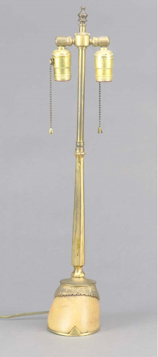 A BRASS MOUNTED HORSE'S HOOF MOUNTED AS A LAMP,