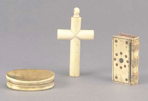 TWO CARVED HORN BOXES AND A BONE CRUCIFIX,