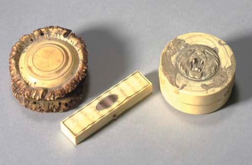 A JAPANESE CARVED IVORY BOX**,