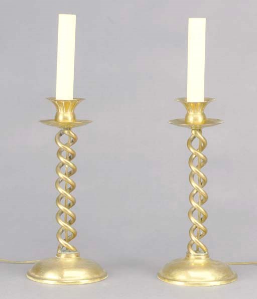 A PAIR OF SPIRAL TWIST BRASS CANDLESTICKS MOUNTED AS LAMPS,