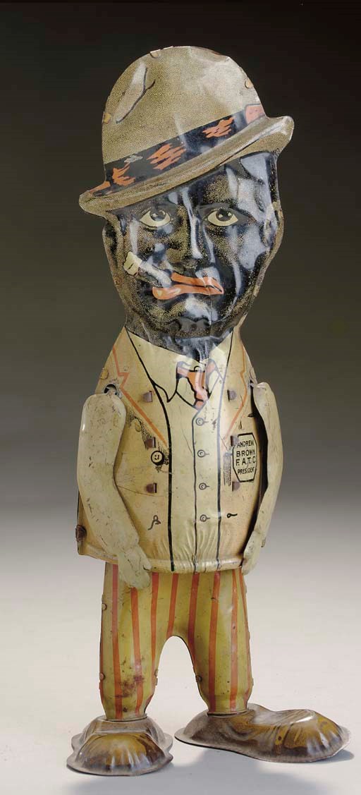 A LOUIS MARX POLYCHROME PAINT DECORATED TIN WIND-UP TOY OF ANDREW BROWN,