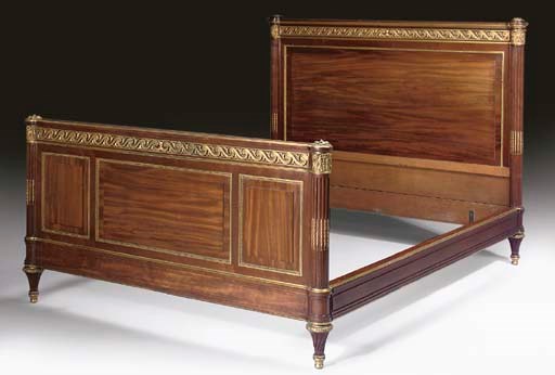 A Louis XVI style ormolu-mounted mahogany bedstead