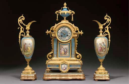 An ormolu and Sevres style turquoise-ground porcelain three-piece garniture