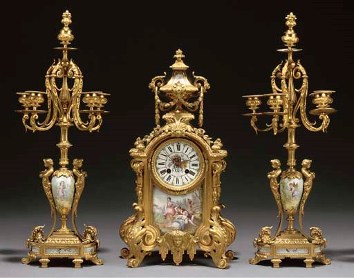 A Napoleon III ormolu and enamel-mounted three-piece garniture