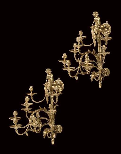 A large pair of ormolu eight-light wall appliques