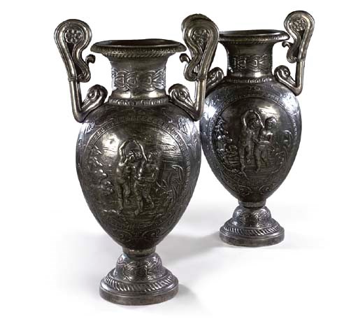 A pair of large Continental silver-patinated cast-iron urns
