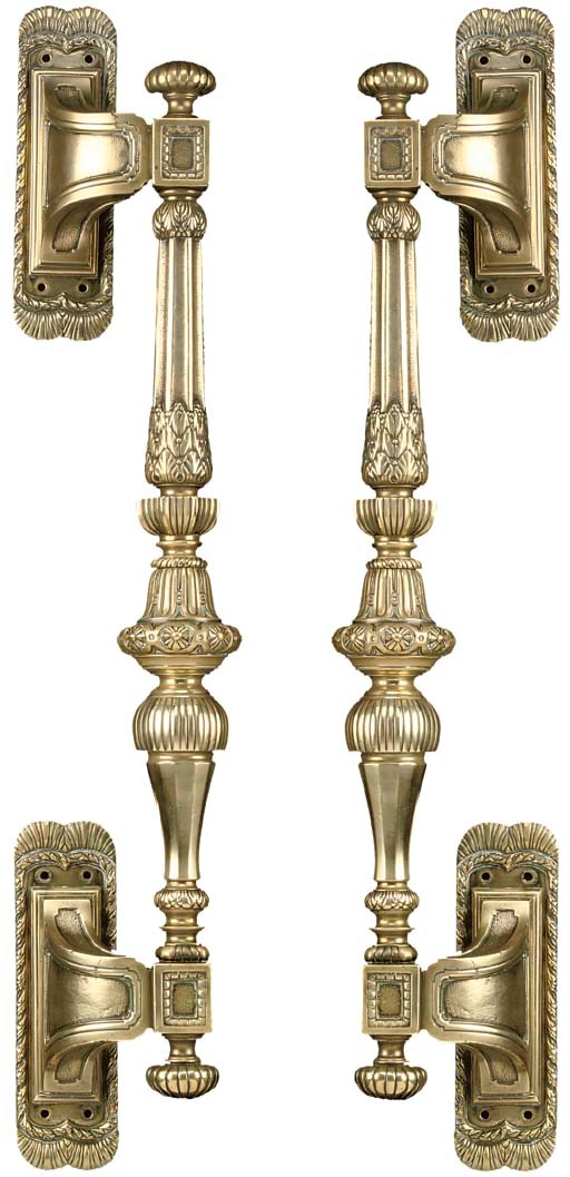 A pair of large cast brass entrance door handles