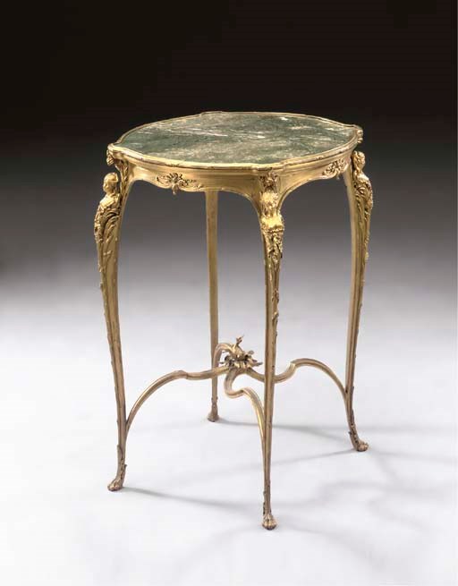 A Louis XV style ormolu and green Serpentine marble gueridon
