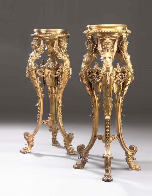 A pair of Napoleon III ormolu pedestals