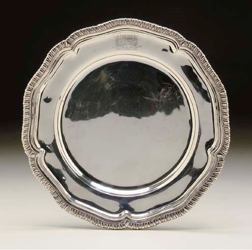 A SET OF TWELVE SILVER DINNER PLATES,