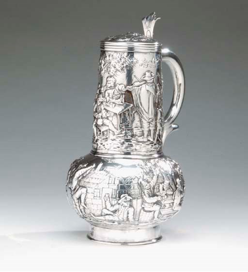 A GERMAN SILVER TANKARD,