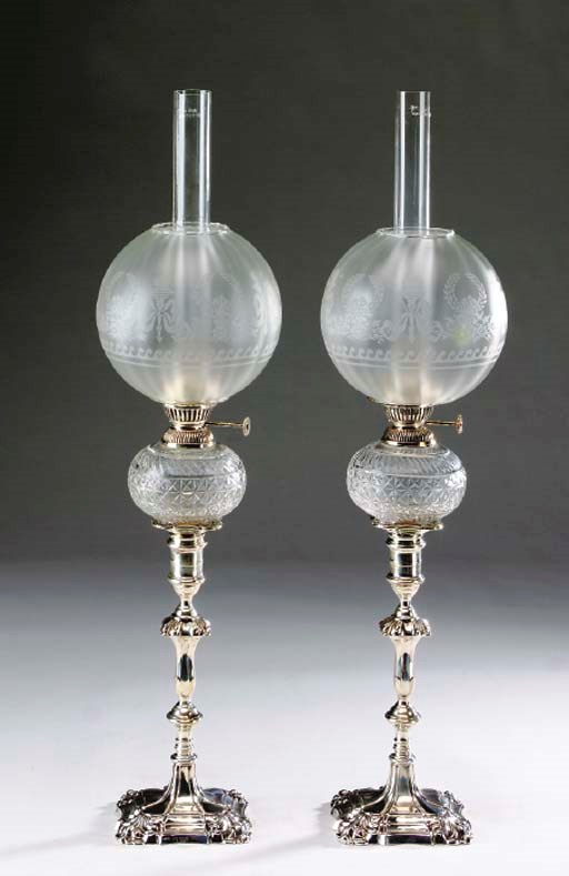 A SET OF FOUR EDWARD VII SILVER LAMPS,