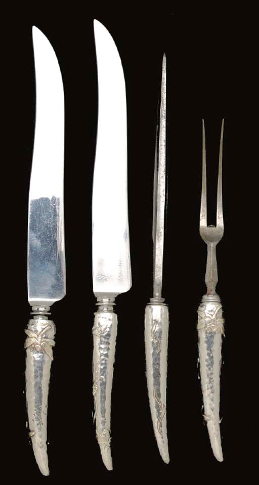 AN ASSEMBLED ENGLISH SILVER-MOUNTED CARVING SET,