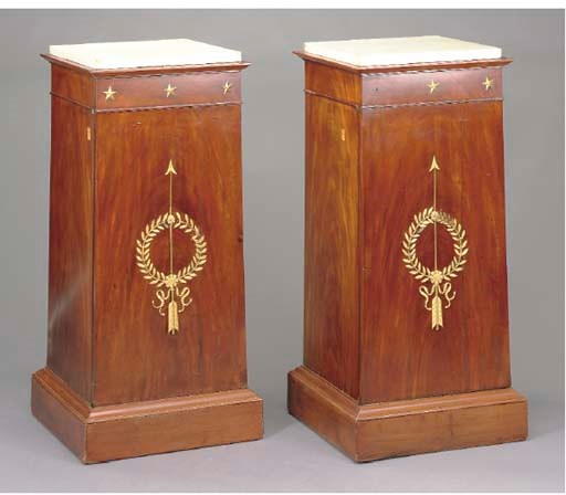 A PAIR OF EMPIRE STYLE ORMOLU-MOUNTED MAHOGANY PEDESTAL CABINETS,