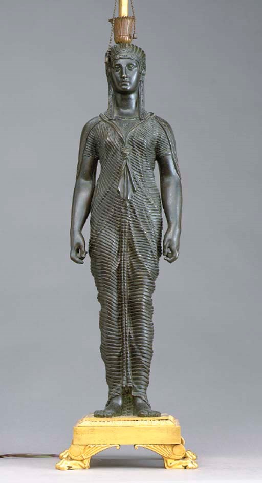 AN EMPIRE STYLE GILT AND PATINATED BRONZE EGYPTIAN FIGURAL LAMP,