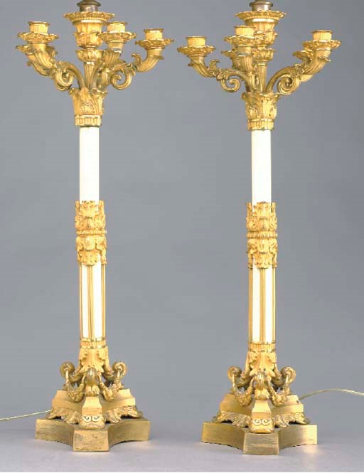 A PAIR OF FRENCH WHITE MARBLE AND ORMOLU SIX-BRANCH CANDELABRA MOUNTED AS LAMPS,