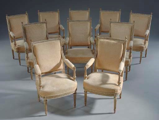 A SET OF TEN LOUIS XVI WHITE-PAINTED AND PARCEL-GILT FAUTEUILS,