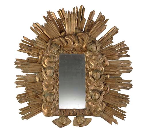 AN ITALIAN GILTWOOD MIRROR,