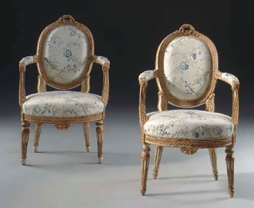 A PAIR OF NORTH ITALIAN WHITE-PAINTED AND PARCEL-GILT ARMCHAIRS,