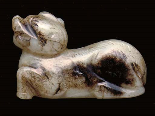 A Chinese mottled grey jade carving of a mythical beast, 17th century