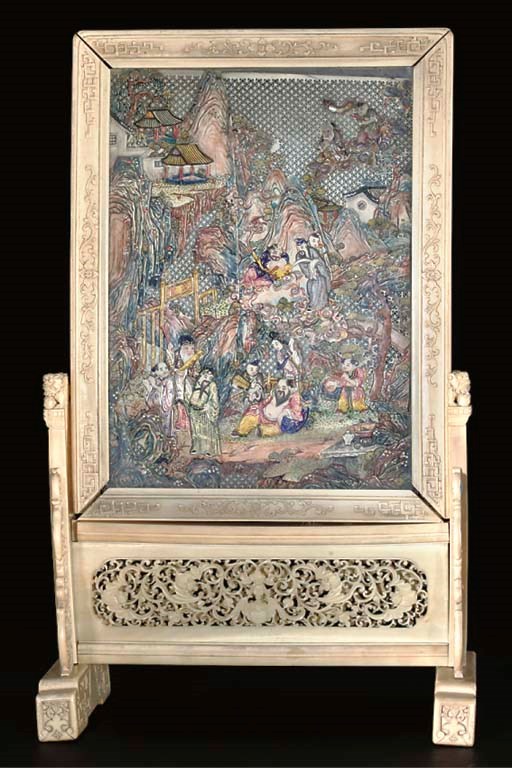 A Chinese stained ivory panel and stand, 18th century