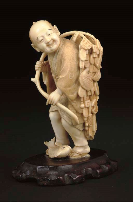 A Japanese ivory okimono of a tradesman, incised signature, Meiji Period