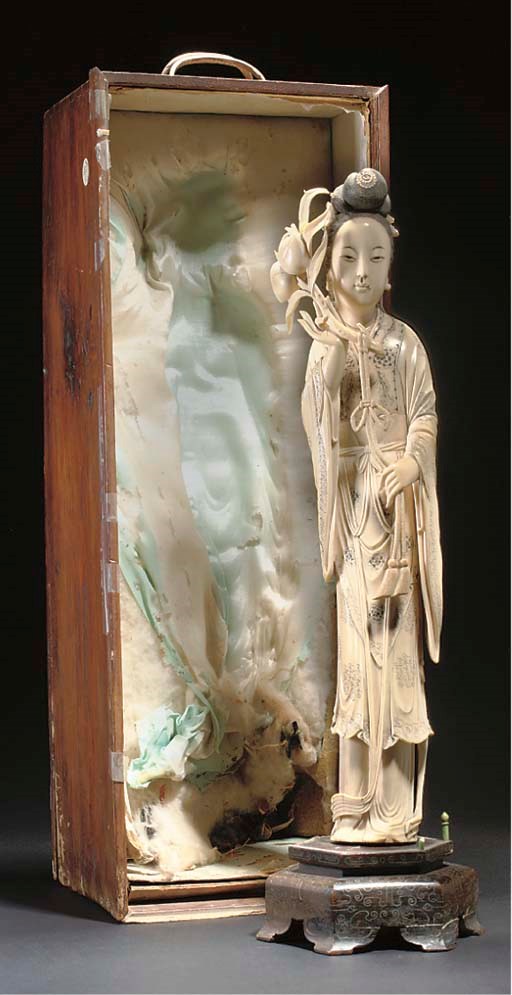 A Chinese ivory model of Guanyin in fitted wooden box, 19th Century