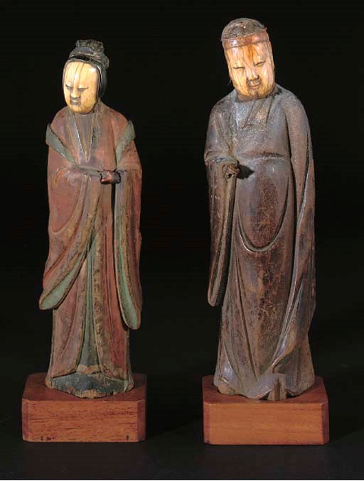 Chinese ivory and wood figures of a scholar and lady, 17th Century