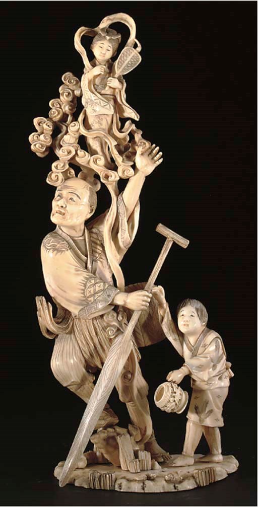 A Japanese sectional ivory okimono of a figural group upon a beach, incised signature, 19th Century