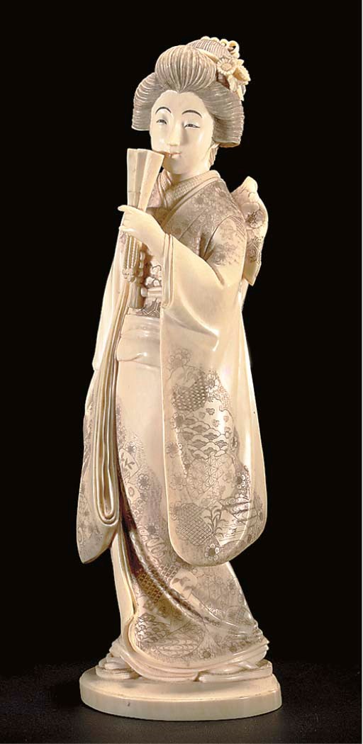 A Japanese ivory okimono of a Bijin with fan, red lacquer signature tablet, early 20th Century