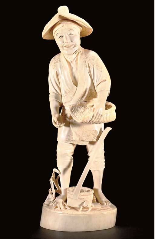 A Japanese ivory okimono of a farming peasant, Meiji period