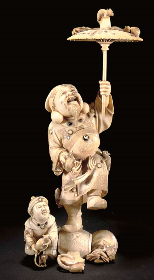 A Japanese ivory okimono of Daikoku and child, red lacquer signature tablet, 19th century