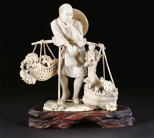 A Japanese ivory okimono of a flower seller, incised and red lacquer signature tablet, Meiji Period