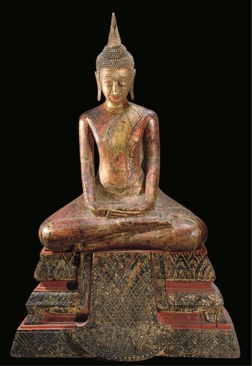 A large lacquered and gilt wood model of Buddha, Northern Thailand or Laos, 18th century